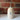 Cowrie shell oil pourer