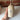 Cowrie shell oil pourer