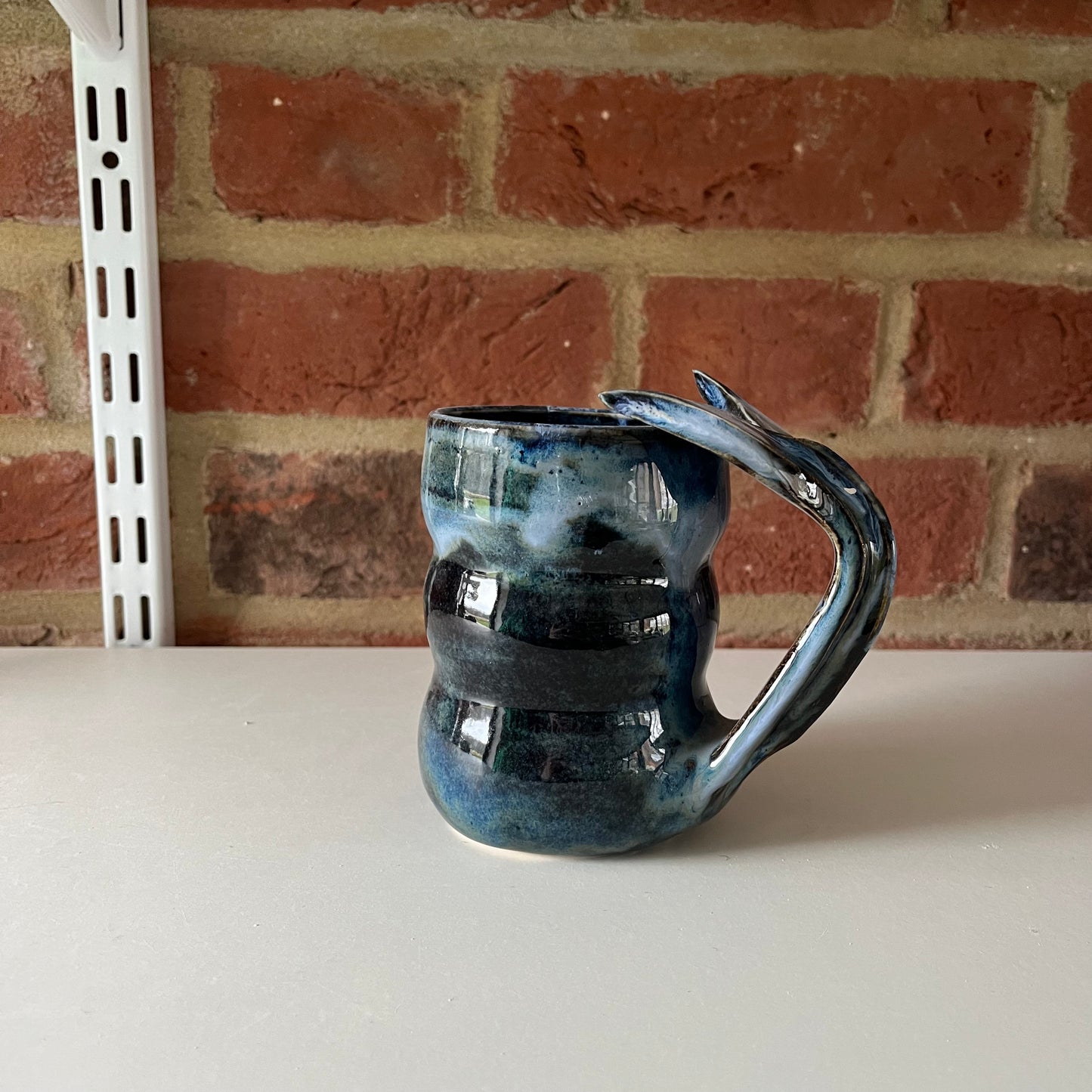 Imperfect blue whale tail mug